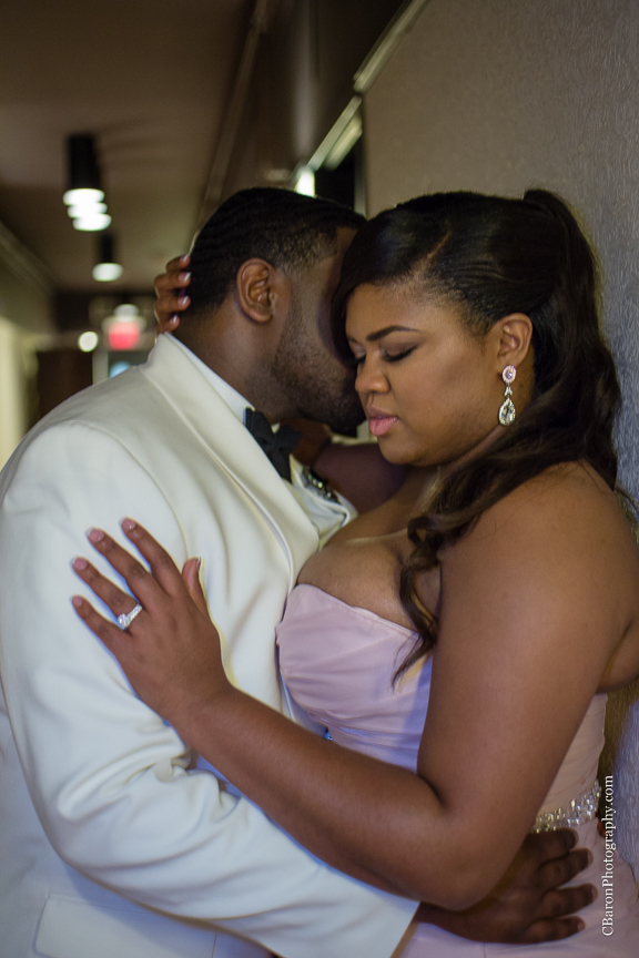 Baby's breath; Black Tie; Blush gown; Brooch Bouquet; Brooch Boutin boutonnière; C. Baron Photography; Clutch purse; Downtown Houston; Evening; First look. Spring; Houston Wedding PHotographer; Swanky Photobooth; Texas; The Sam Houston Hotel; Veranda; blush; strapless;