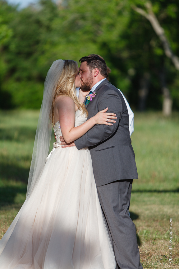 Elegant; Houston Wedding Photographer; Princess Bridal; Texas; Tomball; Tomball Wedding Photographer; Woodlands Wedding photographer; beaded; blue; blush strapless gown; books; c. Baron Photography; chandelier Grove; chandeliers; chic; farmhouse; first look; grand march; lace runner; literary; magenta; mint; mismatched china; old barn; outdoor ceremony; rolls royce; roses; sparklers; tulle ballgown; wedding band; 