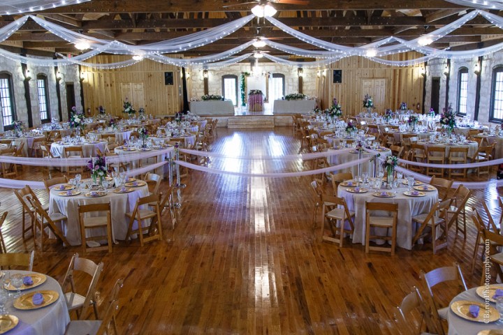 Bride; Couple; Cystal Springs; Groom; Houston Wedding Photographer; Magnolia; Purple; Springs Events; Texas; Wedding; Woodlands Wedding PHotographer; candles; crystal chandeliers; elegant; lavendar; lilac; outdoor ceremony;