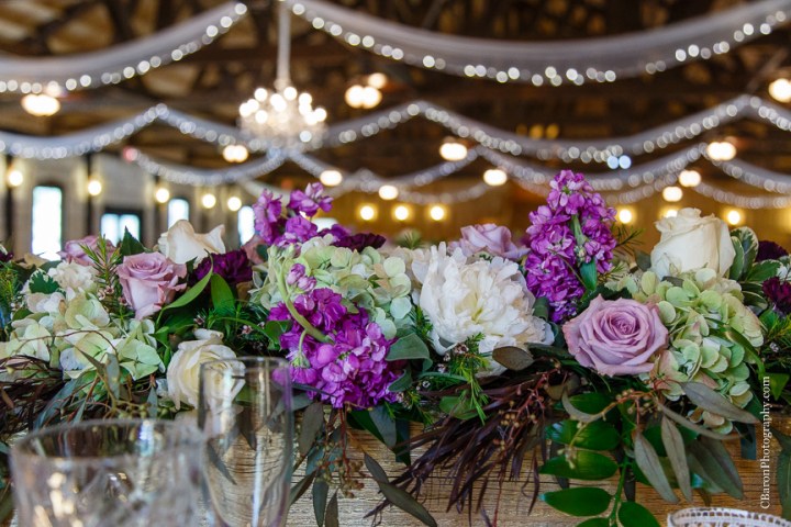 Bride; Couple; Cystal Springs; Groom; Houston Wedding Photographer; Magnolia; Purple; Springs Events; Texas; Wedding; Woodlands Wedding PHotographer; candles; crystal chandeliers; elegant; lavendar; lilac; outdoor ceremony;