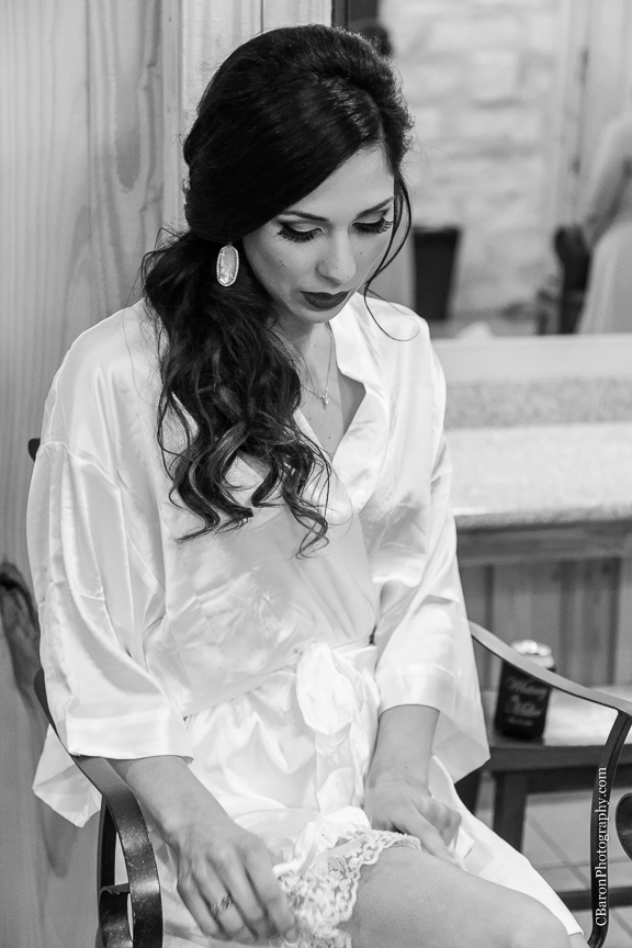 Bride; Couple; Cystal Springs; Groom; Houston Wedding Photographer; Magnolia; Purple; Springs Events; Texas; Wedding; Woodlands Wedding PHotographer; candles; crystal chandeliers; elegant; lavendar; lilac; outdoor ceremony;