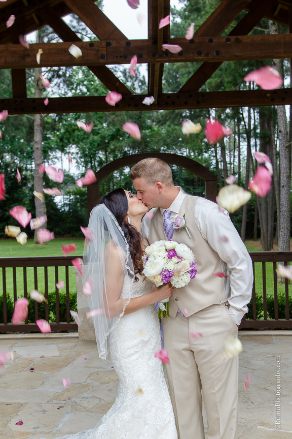 Bride; Couple; Cystal Springs; Groom; Houston Wedding Photographer; Magnolia; Purple; Springs Events; Texas; Wedding; Woodlands Wedding PHotographer; candles; crystal chandeliers; elegant; lavendar; lilac; outdoor ceremony;