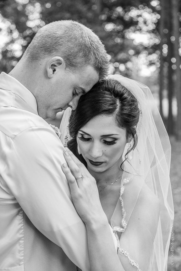 Bride; Couple; Cystal Springs; Groom; Houston Wedding Photographer; Magnolia; Purple; Springs Events; Texas; Wedding; Woodlands Wedding PHotographer; candles; crystal chandeliers; elegant; lavendar; lilac; outdoor ceremony;