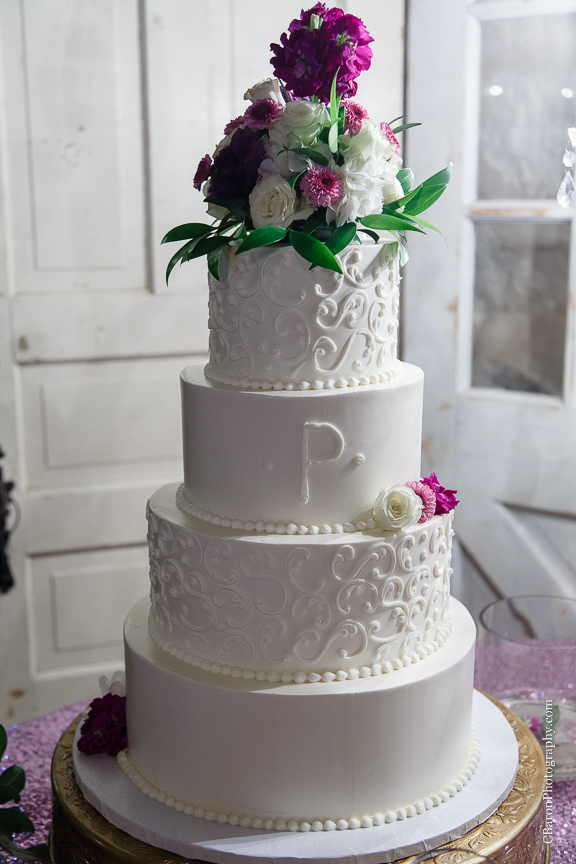 Bride; Couple; Cystal Springs; Groom; Houston Wedding Photographer; Magnolia; Purple; Springs Events; Texas; Wedding; Woodlands Wedding PHotographer; candles; crystal chandeliers; elegant; lavendar; lilac; outdoor ceremony;