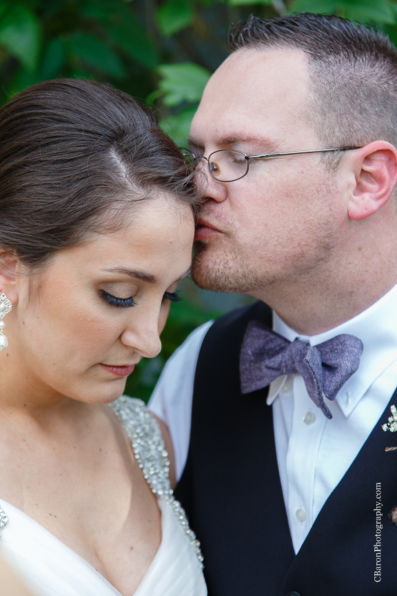 Houston Wedding Photographer; Olde Dobbin Station. Texas Wedding PHotographer; Texas; Woodlands Wedding Photographer; c. Baron Photography; first look; handerchief hem; lavendar; navy; outdoor ceremony; purple; shoe game; sparklers; wedding; white; 