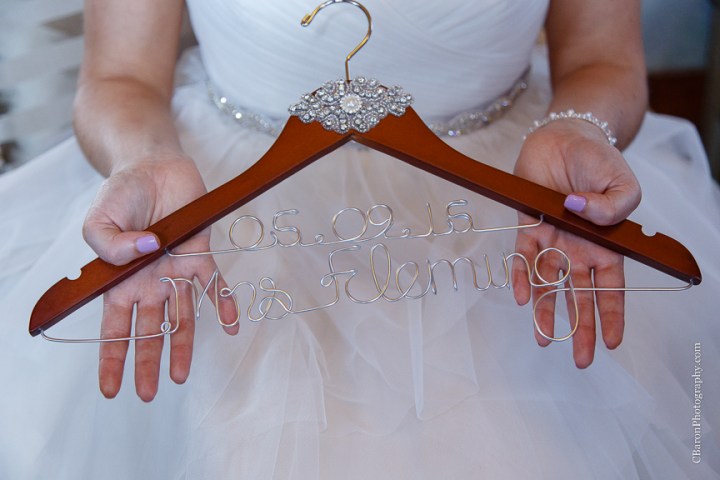 Houston Wedding Photographer; Olde Dobbin Station. Texas Wedding PHotographer; Texas; Woodlands Wedding Photographer; c. Baron Photography; first look; handerchief hem; lavendar; navy; outdoor ceremony; purple; shoe game; sparklers; wedding; white; 