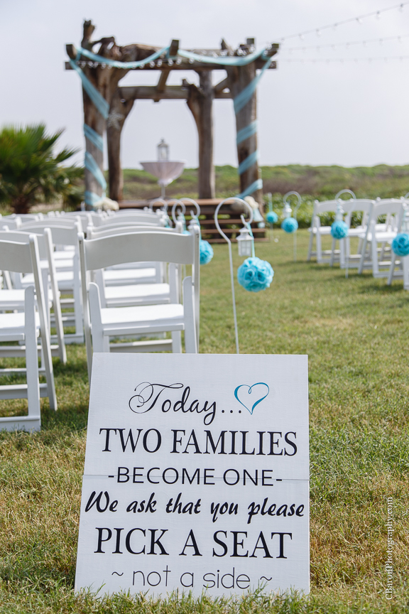 Aqua; Beach House; Beach Photographer; Beach Wedding; Blue; Bolivar Peninsula; C. Baron Photography; Crystal Beach; Crystal Beach Weddings; Galveston County; Galveston Wedding Photographer; Houston Wedding Photographer; Paper flowers; Tropical theme; Turquoise; barefoot; beach; brooch; coral; ferry; fireworks; gulf; lace gown; ocean; sand; sand dunes; sandals; sea; seashells; sunglasses; updo; waves; wayfarers; 
