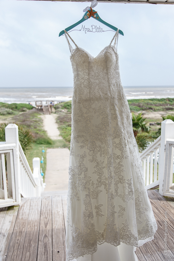 Aqua; Beach House; Beach Photographer; Beach Wedding; Blue; Bolivar Peninsula; C. Baron Photography; Crystal Beach; Crystal Beach Weddings; Galveston County; Galveston Wedding Photographer; Houston Wedding Photographer; Paper flowers; Tropical theme; Turquoise; barefoot; beach; brooch; coral; ferry; fireworks; gulf; lace gown; ocean; sand; sand dunes; sandals; sea; seashells; sunglasses; updo; waves; wayfarers; 