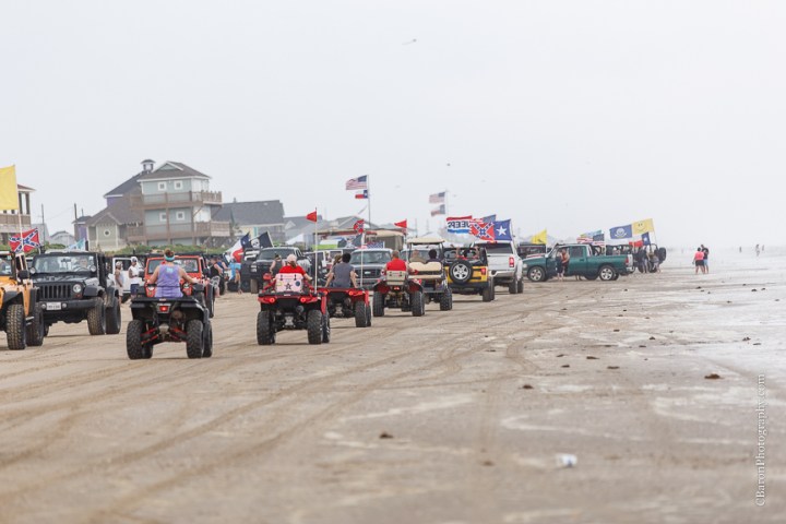 Aqua; Beach House; Beach Photographer; Beach Wedding; Blue; Bolivar Peninsula; C. Baron Photography; Crystal Beach; Crystal Beach Weddings; Galveston County; Galveston Wedding Photographer; Houston Wedding Photographer; Paper flowers; Tropical theme; Turquoise; barefoot; beach; brooch; coral; ferry; fireworks; gulf; lace gown; ocean; sand; sand dunes; sandals; sea; seashells; sunglasses; updo; waves; wayfarers; 