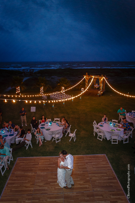 Aqua; Beach House; Beach Photographer; Beach Wedding; Blue; Bolivar Peninsula; C. Baron Photography; Crystal Beach; Crystal Beach Weddings; Galveston County; Galveston Wedding Photographer; Houston Wedding Photographer; Paper flowers; Tropical theme; Turquoise; barefoot; beach; brooch; coral; ferry; fireworks; gulf; lace gown; ocean; sand; sand dunes; sandals; sea; seashells; sunglasses; updo; waves; wayfarers; 