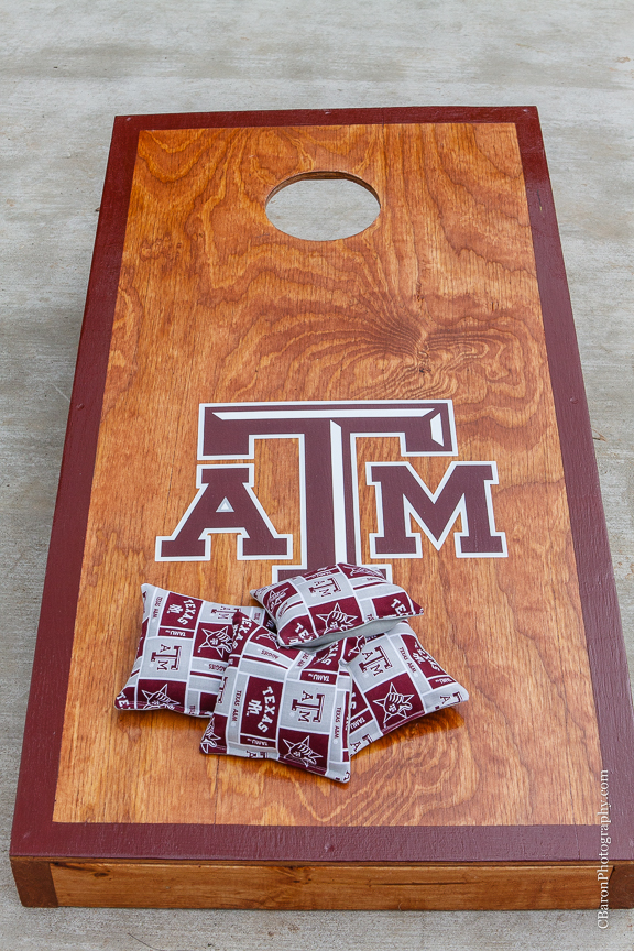 57 chevy; Aggie; Aggie War Hymn; Astin Mansion; Bride; Bryan; C. Baron Photography; Groom; Houston Wedding Photographer; National Guard; Navy; Old Truck; Red; Texas; Texas A&M; Wedding; White; blue; chalk art; couple; cowboy boots; strapless;