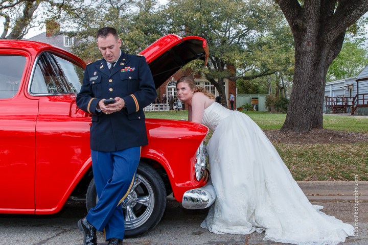 57 chevy; Aggie; Aggie War Hymn; Astin Mansion; Bride; Bryan; C. Baron Photography; Groom; Houston Wedding Photographer; National Guard; Navy; Old Truck; Red; Texas; Texas A&M; Wedding; White; blue; chalk art; couple; cowboy boots; strapless;