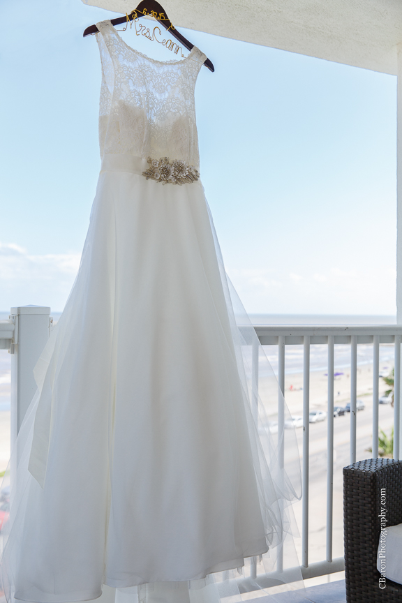 Bride; Dad's first look; Galveston; Galveston Historical Foundation; Galveston Wedding Photographer; Groom; Oldest German Church; St. Joseph's Church; Summer; Texas; The Strand; The Trolley Station; Wedding band; couple; grey; silver; 