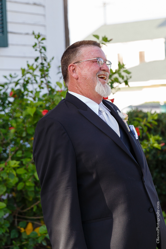 Bride; Dad's first look; Galveston; Galveston Historical Foundation; Galveston Wedding Photographer; Groom; Oldest German Church; St. Joseph's Church; Summer; Texas; The Strand; The Trolley Station; Wedding band; couple; grey; silver; 