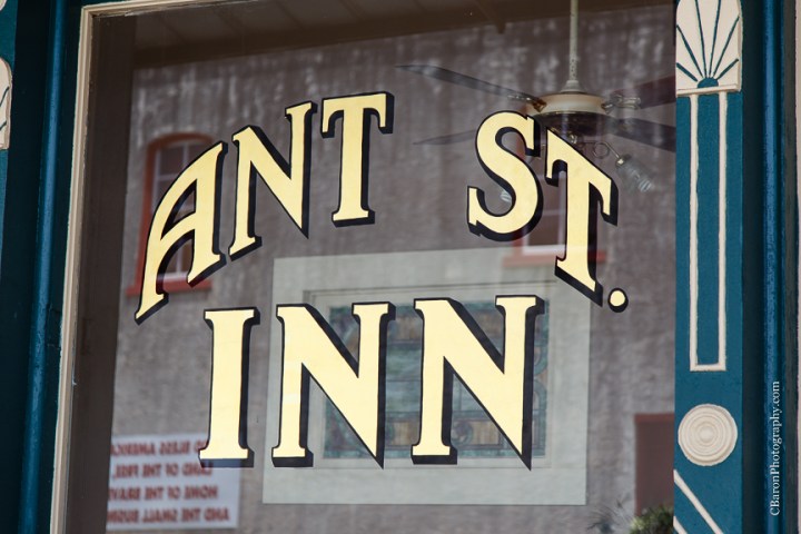 Aggie Photographer; Aggie Wedding; Aggies; Ant Inn; Antique; Blue; Brenham Wedding Photographer; Bride; C. Baron Photography; Corset; Downtown Brenham; First Look; Groom; Historic; Houston Wedding Photographer; Lace gown; Outdoor Ceremony; Strapless; Texas; Texas A&M; The Ant Street Inn; Yellow; gig 'em; summer; sunflowers; wedding; 