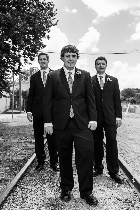 Aggie Photographer; Aggie Wedding; Aggies; Ant Inn; Antique; Blue; Brenham Wedding Photographer; Bride; C. Baron Photography; Corset; Downtown Brenham; First Look; Groom; Historic; Houston Wedding Photographer; Lace gown; Outdoor Ceremony; Strapless; Texas; Texas A&M; The Ant Street Inn; Yellow; gig 'em; summer; sunflowers; wedding; 