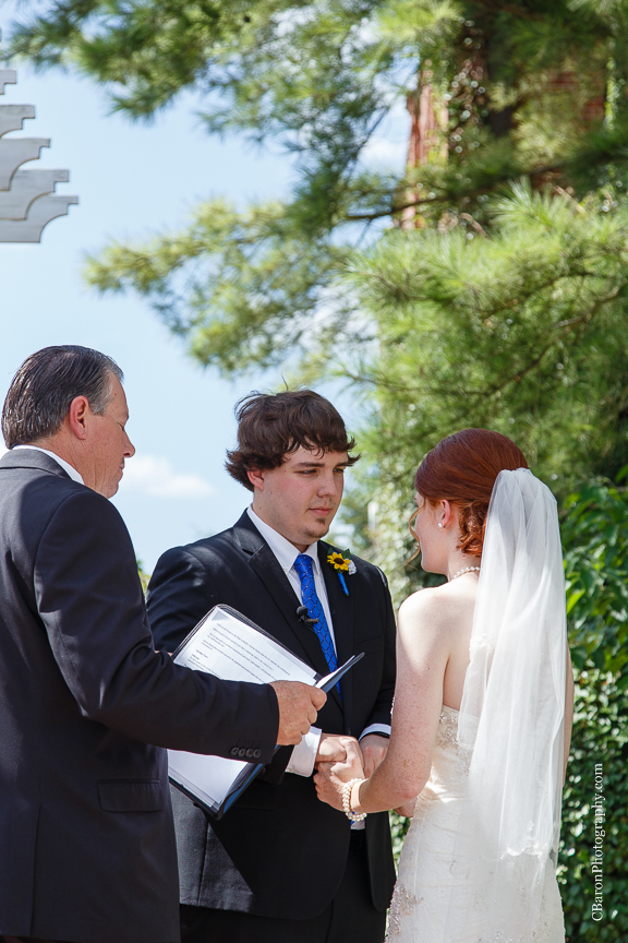 Aggie Photographer; Aggie Wedding; Aggies; Ant Inn; Antique; Blue; Brenham Wedding Photographer; Bride; C. Baron Photography; Corset; Downtown Brenham; First Look; Groom; Historic; Houston Wedding Photographer; Lace gown; Outdoor Ceremony; Strapless; Texas; Texas A&M; The Ant Street Inn; Yellow; gig 'em; summer; sunflowers; wedding; 