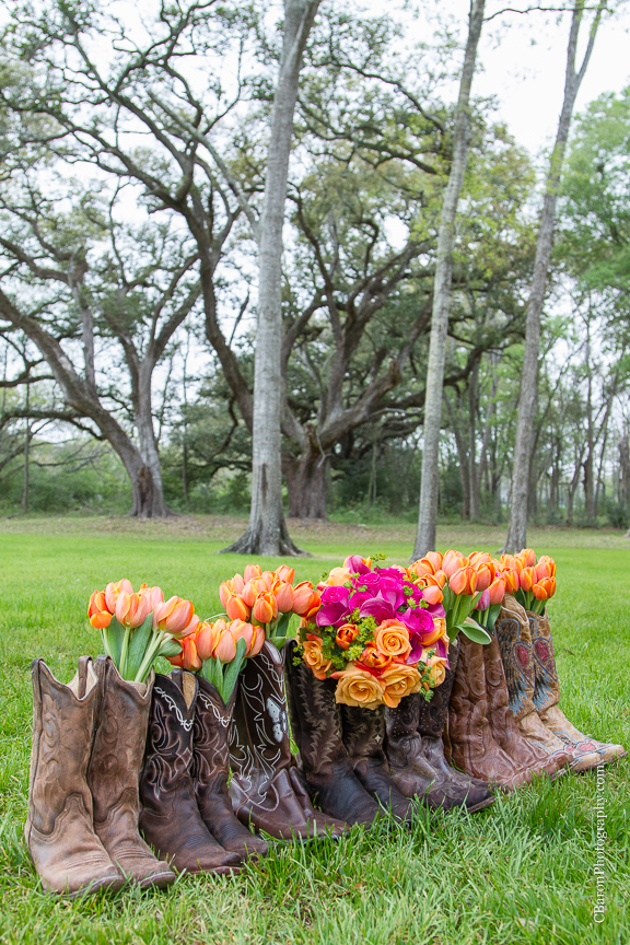 2014; Angleton; Brazos Springs; Bride; C. Baron Photography; Groom; Houston Wedding Photographer; March; Orange; Outdoor; Pink; Texas; Wedding; country; cowboy boots; live oaks; 