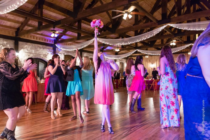 2014; Angleton; Brazos Springs; Bride; C. Baron Photography; Groom; Houston Wedding Photographer; March; Orange; Outdoor; Pink; Texas; Wedding; country; cowboy boots; live oaks; 