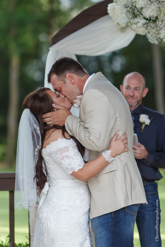 C. Baron Photography; Crystal Springs; Houston Wedding Photographer; July; Magnolia; Magnolia Wedding photographer; Shepherd hooks; Summer; Swanky Photobooth; Texas; Woodlands Wedding Photographer; baby's breath; bell jars; black; bride; brooch bouquet; bubbles; burlap; cloche jars; cowboy boots; groom; ivory; lace; lace gown; memory jars; outdoor ceremony; outdoor wedding; quicksand; rolls royce; roses; 