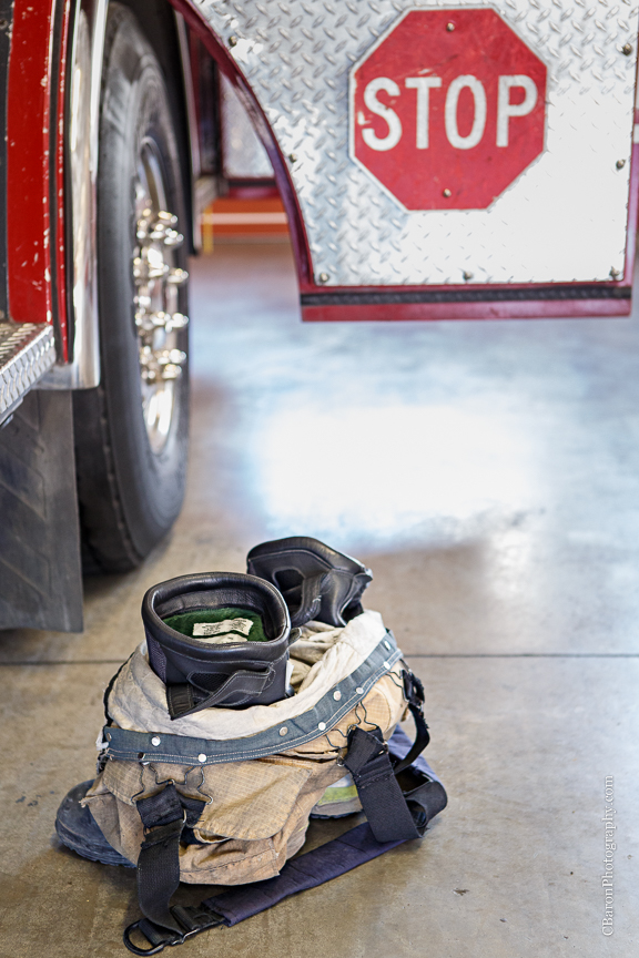 2013; Bride; C. Baron Photography; Downtown; Fire truck; HFD; Houston Wedding Photographer; Texas; fire hose; firemen; houston fire department; strapless gown; trash the dress; 