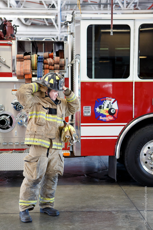 2013; Bride; C. Baron Photography; Downtown; Fire truck; HFD; Houston Wedding Photographer; Texas; fire hose; firemen; houston fire department; strapless gown; trash the dress; 