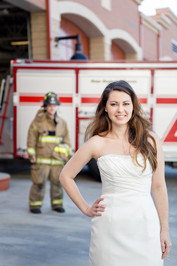 2013; Bride; C. Baron Photography; Downtown; Fire truck; HFD; Houston Wedding Photographer; Texas; fire hose; firemen; houston fire department; strapless gown; trash the dress; 