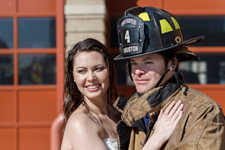2013; Bride; C. Baron Photography; Downtown; Fire truck; HFD; Houston Wedding Photographer; Texas; fire hose; firemen; houston fire department; strapless gown; trash the dress; 