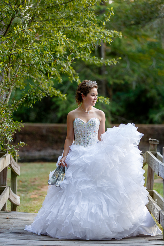 15th; C. Baron Photography; Houston Quince Photographer; Houston Quinceanera Photography; Quince; Quinceanera; dress; outdoors; park; ruffled skirt; sparkle; tiara; young woman; 