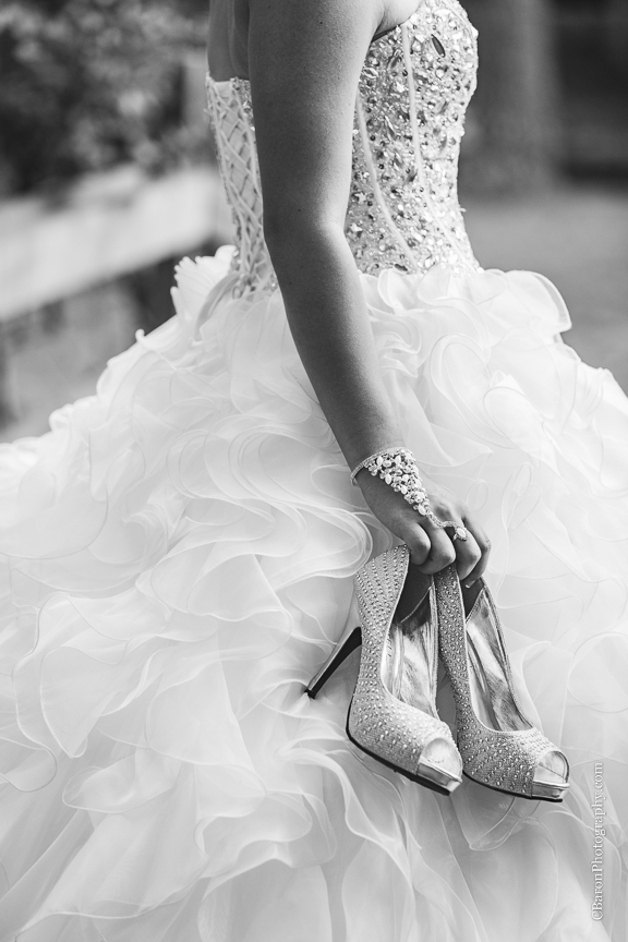 15th; C. Baron Photography; Houston Quince Photographer; Houston Quinceanera Photography; Quince; Quinceanera; dress; outdoors; park; ruffled skirt; sparkle; tiara; young woman; 