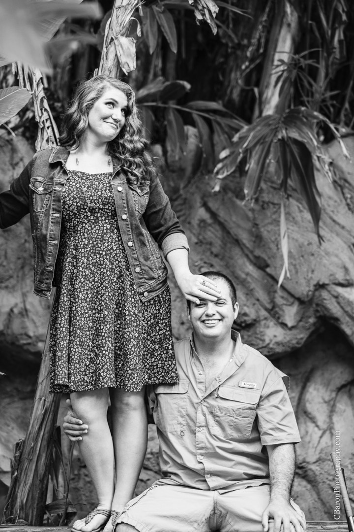 C. Baron Photography; Galveston; Galveston Engagement Photographer; Houston Wedding PHotographer; Jean Jacket; Texas; couple; engagement session; mini-golf; outdoors; putt-putt; summer; tree; 