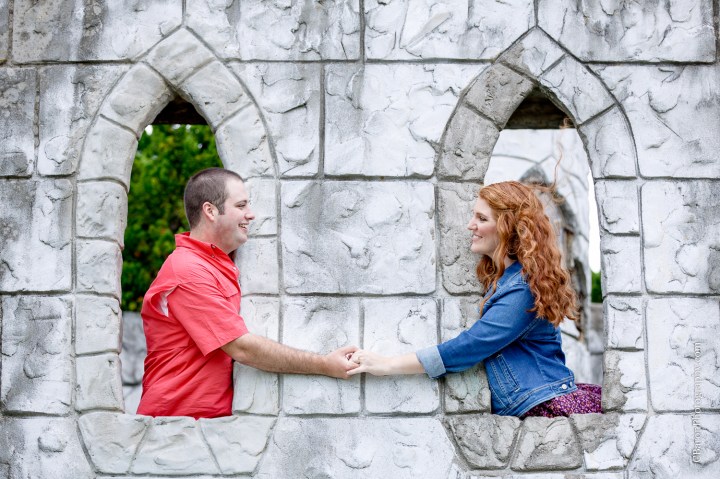 C. Baron Photography; Galveston; Galveston Engagement Photographer; Houston Wedding PHotographer; Jean Jacket; Texas; couple; engagement session; mini-golf; outdoors; putt-putt; summer; tree; 