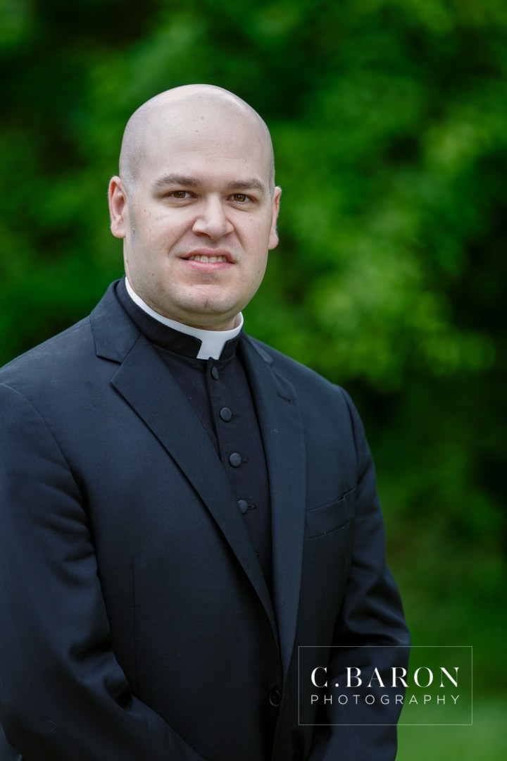 Houston; Ordination; Portrait photographer; Prince of Peace; Texas; altar; clergy; crucifix; portrait; priest; vestments;