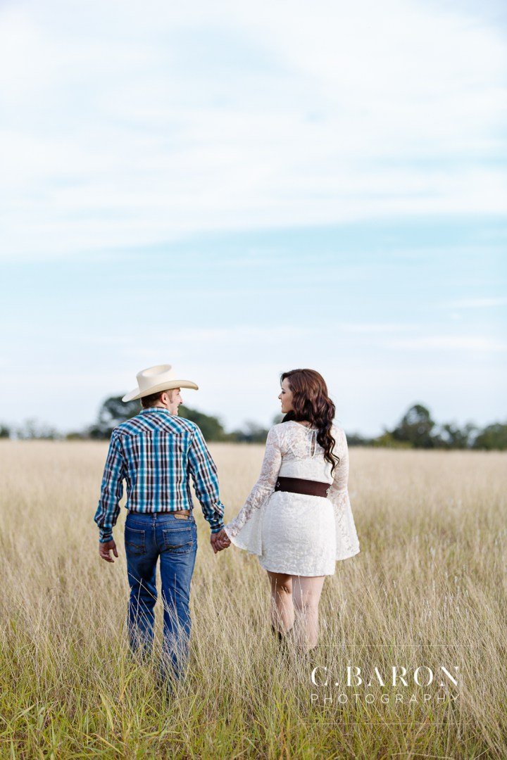 '32 Ford, Brenham Engagement Photographer, C. Baron Photography, camo, Country, Couple, cowboy hat, donkeys, Engagement session, farm, Fence, Grass, hills, Houston Engagement Photographer, John Deere Tractor, Old Oaks, sunset, Texas