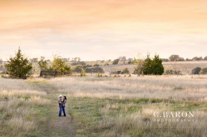 '32 Ford, Brenham Engagement Photographer, C. Baron Photography, camo, Country, Couple, cowboy hat, donkeys, Engagement session, farm, Fence, Grass, hills, Houston Engagement Photographer, John Deere Tractor, Old Oaks, sunset, Texas