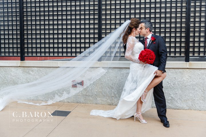 Al Capone Suite; Bride; C. Baron Photography; Couple; Dubuque; Groom; Hotel Julien; Houston Wedding Photographer; Iowa; Main Street; Red; Roses; Wedding; black; white;