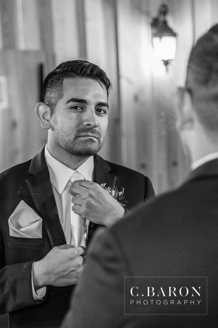 Amber Springs; Austin Wedding Photographer; Beaumont Wedding Photographer; C. Baron PHotography; Christmas; College Station wedding Photographer; Conroe Wedding Photograher; Conroe Wedding Photographer; Galveston Wedding Photographer; Houston Wedding Photographer; Pine cones; Pines; Stonehall; Texas; Winter; Woodlands Wedding Photographer; candlelight; christmas lights; couple; evening; weddings;