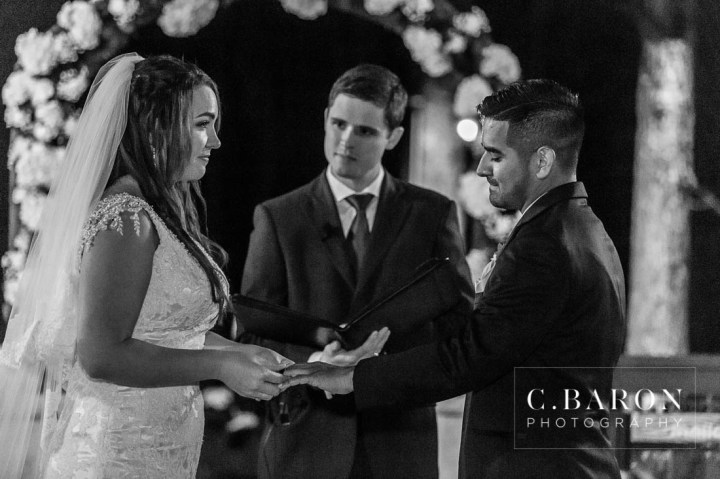 Amber Springs; Austin Wedding Photographer; Beaumont Wedding Photographer; C. Baron PHotography; Christmas; College Station wedding Photographer; Conroe Wedding Photograher; Conroe Wedding Photographer; Galveston Wedding Photographer; Houston Wedding Photographer; Pine cones; Pines; Stonehall; Texas; Winter; Woodlands Wedding Photographer; candlelight; christmas lights; couple; evening; weddings;