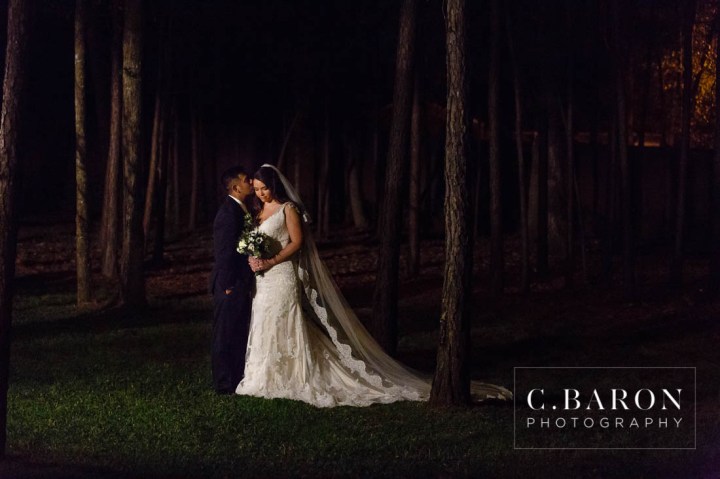 Amber Springs; Austin Wedding Photographer; Beaumont Wedding Photographer; C. Baron PHotography; Christmas; College Station wedding Photographer; Conroe Wedding Photograher; Conroe Wedding Photographer; Galveston Wedding Photographer; Houston Wedding Photographer; Pine cones; Pines; Stonehall; Texas; Winter; Woodlands Wedding Photographer; candlelight; christmas lights; couple; evening; weddings;