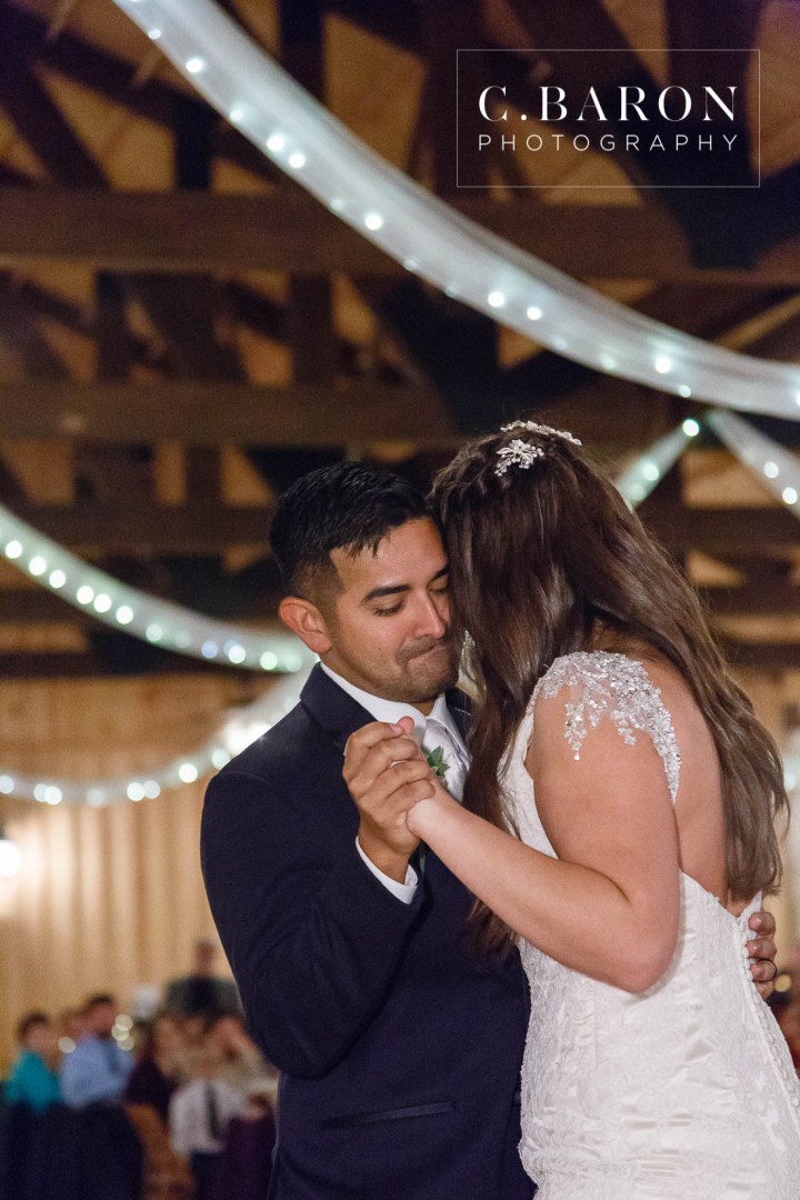 Amber Springs; Austin Wedding Photographer; Beaumont Wedding Photographer; C. Baron PHotography; Christmas; College Station wedding Photographer; Conroe Wedding Photograher; Conroe Wedding Photographer; Galveston Wedding Photographer; Houston Wedding Photographer; Pine cones; Pines; Stonehall; Texas; Winter; Woodlands Wedding Photographer; candlelight; christmas lights; couple; evening; weddings;