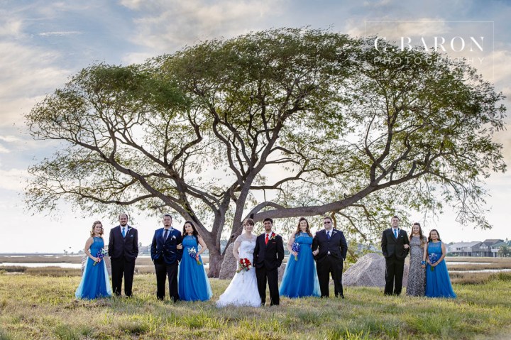 Aqua; Austin Wedding Photographer; Beaumont wedding Photographer; Blue; Blues; C. Baron Photography; Catholic ceremony; Clear Lake; College Station wedding Photographer; Conroe Wedding Photograher; Couple; Galveston Bay; Galveston Wedding; Galveston Wedding Photographer; Groom; Houston wedding Photographer; Nassau Bay; Shoe Game; St. Paul's Catholic Church; Starfish; Texas; Turquoise; Vintage Rolls Royce; Water View; Waterfront Event Center; Wedding; Woodlands Wedding Photographer; beach theme; beaded cape; blue orchid; bride; dancing on a cloud; dendrobium orchid; first look; sunset; winter;