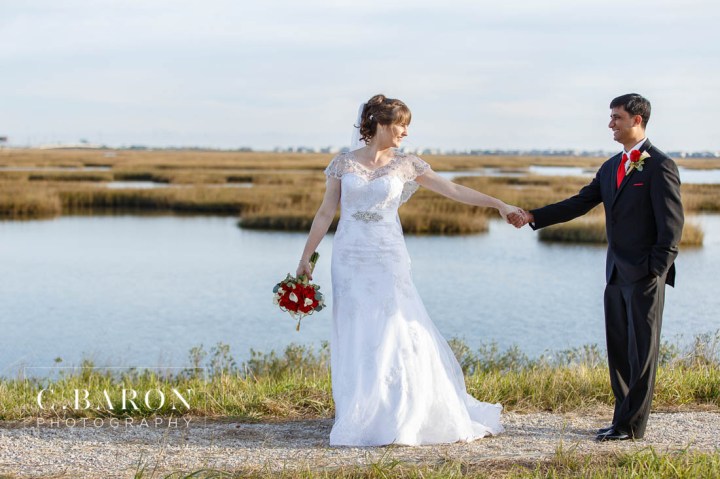 Aqua; Austin Wedding Photographer; Beaumont wedding Photographer; Blue; Blues; C. Baron Photography; Catholic ceremony; Clear Lake; College Station wedding Photographer; Conroe Wedding Photograher; Couple; Galveston Bay; Galveston Wedding; Galveston Wedding Photographer; Groom; Houston wedding Photographer; Nassau Bay; Shoe Game; St. Paul's Catholic Church; Starfish; Texas; Turquoise; Vintage Rolls Royce; Water View; Waterfront Event Center; Wedding; Woodlands Wedding Photographer; beach theme; beaded cape; blue orchid; bride; dancing on a cloud; dendrobium orchid; first look; sunset; winter;