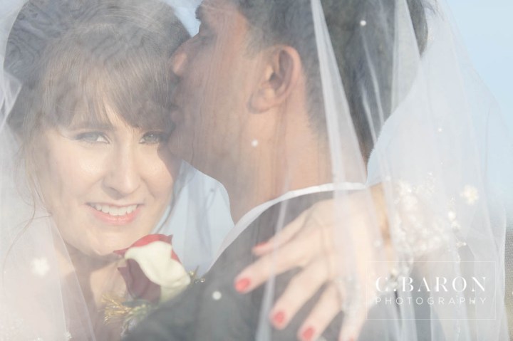 Aqua; Austin Wedding Photographer; Beaumont wedding Photographer; Blue; Blues; C. Baron Photography; Catholic ceremony; Clear Lake; College Station wedding Photographer; Conroe Wedding Photograher; Couple; Galveston Bay; Galveston Wedding; Galveston Wedding Photographer; Groom; Houston wedding Photographer; Nassau Bay; Shoe Game; St. Paul's Catholic Church; Starfish; Texas; Turquoise; Vintage Rolls Royce; Water View; Waterfront Event Center; Wedding; Woodlands Wedding Photographer; beach theme; beaded cape; blue orchid; bride; dancing on a cloud; dendrobium orchid; first look; sunset; winter;