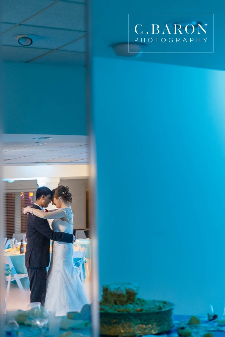 Aqua; Austin Wedding Photographer; Beaumont wedding Photographer; Blue; Blues; C. Baron Photography; Catholic ceremony; Clear Lake; College Station wedding Photographer; Conroe Wedding Photograher; Couple; Galveston Bay; Galveston Wedding; Galveston Wedding Photographer; Groom; Houston wedding Photographer; Nassau Bay; Shoe Game; St. Paul's Catholic Church; Starfish; Texas; Turquoise; Vintage Rolls Royce; Water View; Waterfront Event Center; Wedding; Woodlands Wedding Photographer; beach theme; beaded cape; blue orchid; bride; dancing on a cloud; dendrobium orchid; first look; sunset; winter;