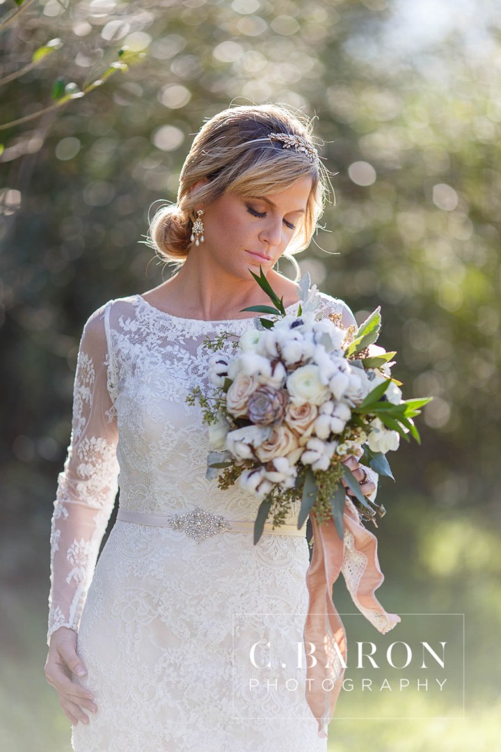 C. Baron Photography; Cornelius florist of Tomball; Cotton Bolls; Edible Moments; Elegant; Houston Wedding Planners; Houston Wedding Venue; Houston wedding Photographer; Lace gown; Long Sleeved dress; Luxury; Moffitt Oaks; Polished Wedding Planning; Rose Gold; Rustic; Serenity Blue; Something Blue Bridals; Texas; Tomball; anemone; chandeliers; corral; gold headband; luxurious; ranunculus; smilax; stable; winter;