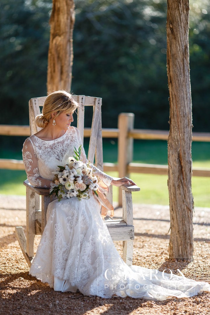 C. Baron Photography; Cornelius florist of Tomball; Cotton Bolls; Edible Moments; Elegant; Houston Wedding Planners; Houston Wedding Venue; Houston wedding Photographer; Lace gown; Long Sleeved dress; Luxury; Moffitt Oaks; Polished Wedding Planning; Rose Gold; Rustic; Serenity Blue; Something Blue Bridals; Texas; Tomball; anemone; chandeliers; corral; gold headband; luxurious; ranunculus; smilax; stable; winter;