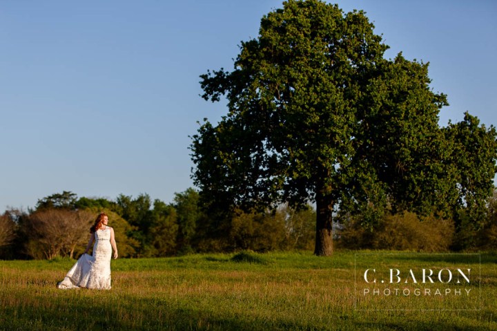 Aggies; Bluebonnets; Bridals; Campus; College Station wedding Photographer; Impression Bridal; TAMU; Texas A&M University; bottle cap Alley; on campus; red head. bridals; ruby engagement ring; sunny day; veil;
