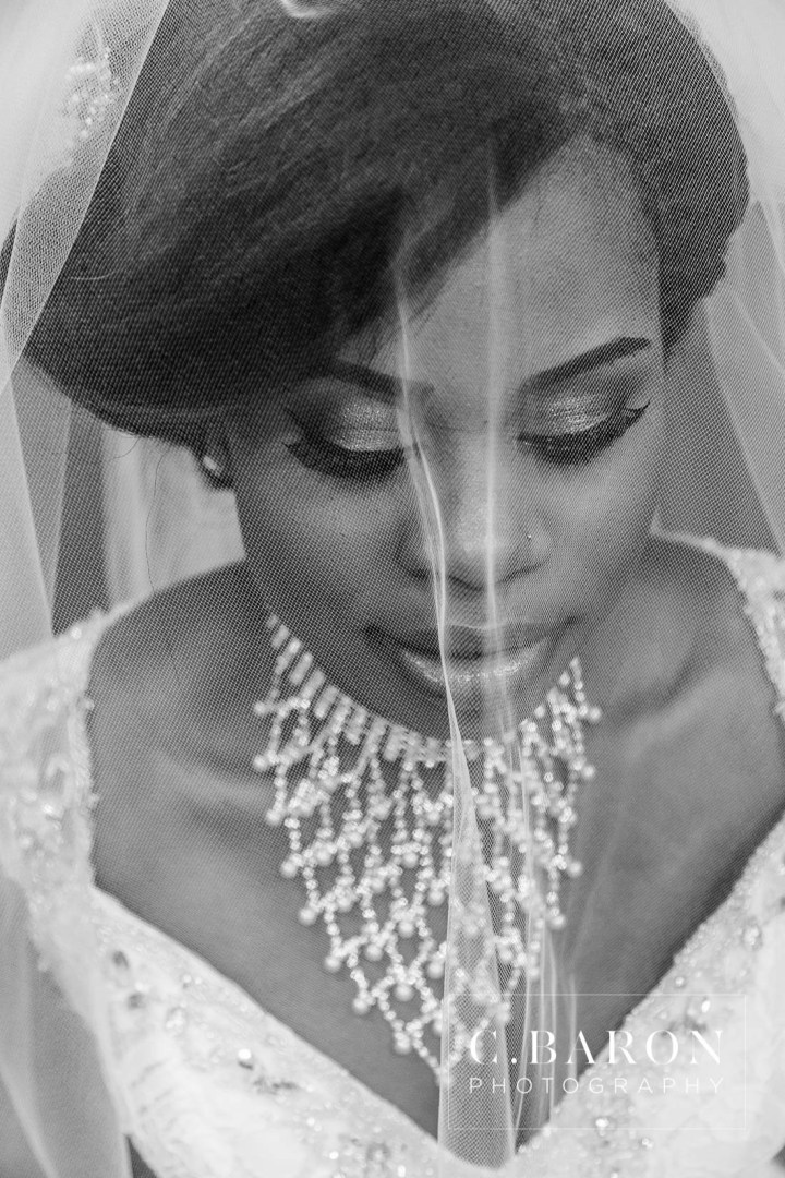 Austin Wedding Photographer; Beaumont wedding Photographer; C. Baron Photography; Catholic mass; College Station wedding Photographer; Conroe Wedding Photograher; Coral; Couple; Galveston Wedding Photographer; Groom; Houston wedding Photographer; Nigerian Wedding; Peach; Pearland; St. Helen's Catholic Church; Texas; The Bougainvilleas; Wedding; Woodlands Wedding Photographer; blush; bride; brooch bouquet; church wedding;