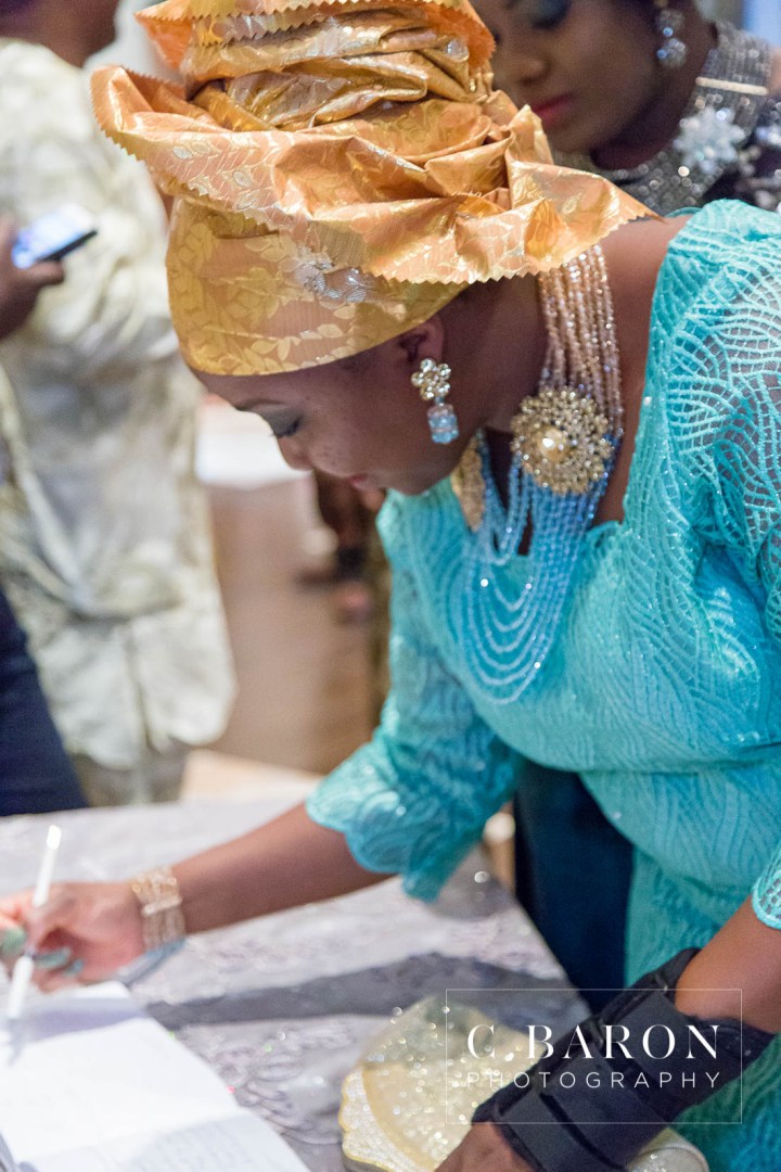 Austin Wedding Photographer; Beaumont wedding Photographer; C. Baron Photography; Catholic mass; College Station wedding Photographer; Conroe Wedding Photograher; Coral; Couple; Galveston Wedding Photographer; Groom; Houston wedding Photographer; Nigerian Wedding; Peach; Pearland; St. Helen's Catholic Church; Texas; The Bougainvilleas; Wedding; Woodlands Wedding Photographer; blush; bride; brooch bouquet; church wedding;