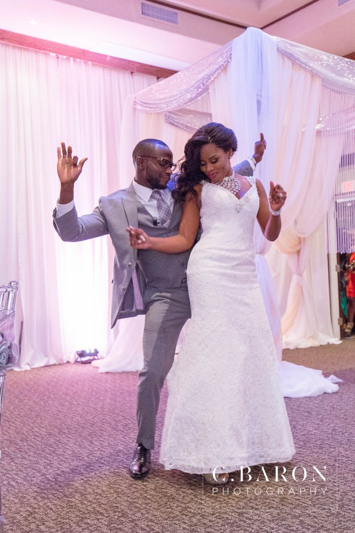 Austin Wedding Photographer; Beaumont wedding Photographer; C. Baron Photography; Catholic mass; College Station wedding Photographer; Conroe Wedding Photograher; Coral; Couple; Galveston Wedding Photographer; Groom; Houston wedding Photographer; Nigerian Wedding; Peach; Pearland; St. Helen's Catholic Church; Texas; The Bougainvilleas; Wedding; Woodlands Wedding Photographer; blush; bride; brooch bouquet; church wedding;